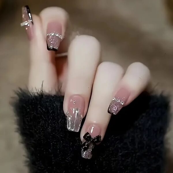 24-Piece Long Ballet Coffin Nails in Pink Tone with Glitter Pattern and Glossy Finish Featuring 3D Butterfly Accents.